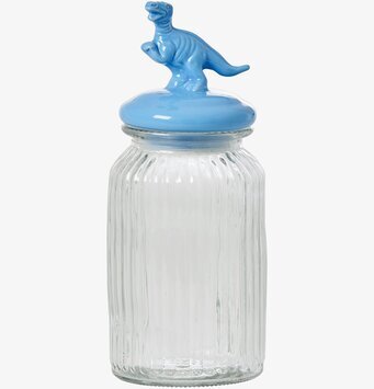 Bild av glasburk med blått lock och dinosauriedekor