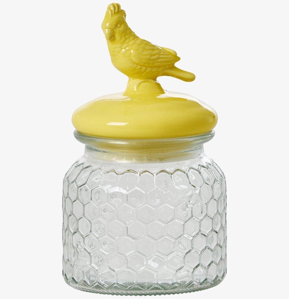 Bild av glasburk med bikakemönster och kakadualock