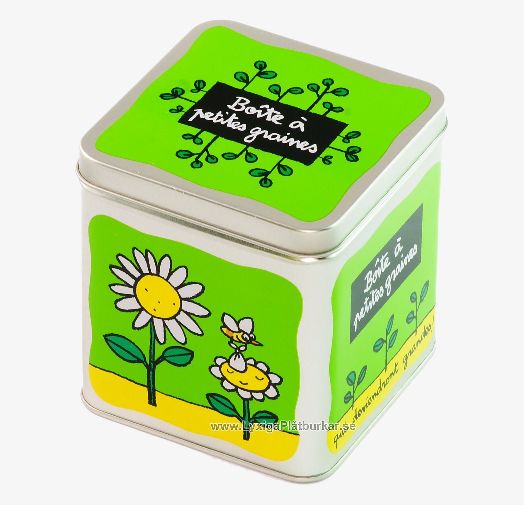 Bild av grön plåtburk med blommor och fågelmotiv