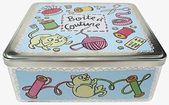 Bild av charmant ljusblå plåtburk med syrelaterade motiv