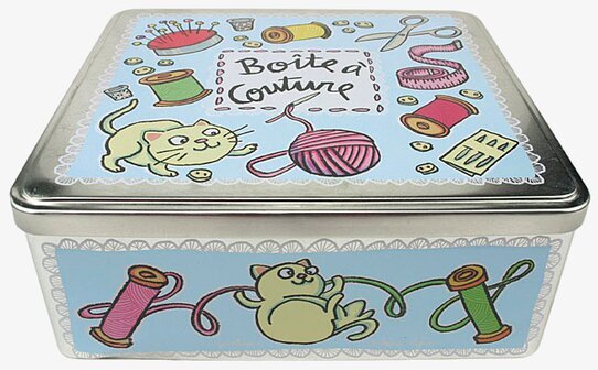 Bild av charmant ljusblå plåtburk med syrelaterade motiv