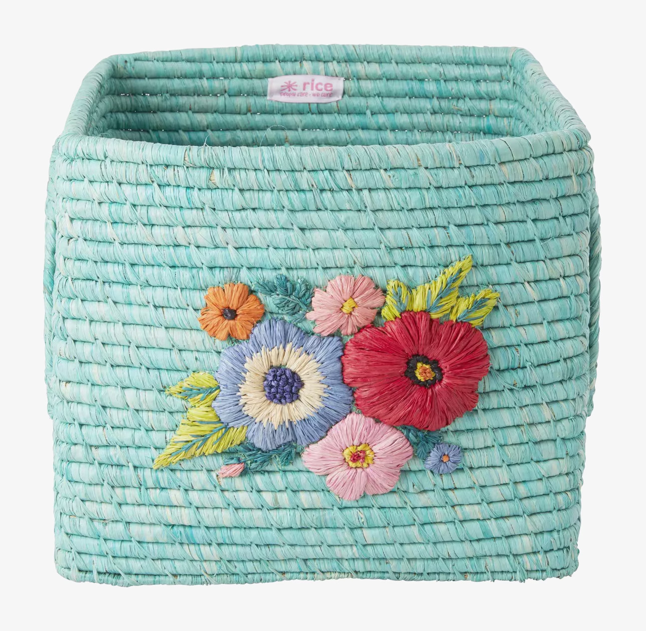 Bild av mintgrön förvaringskorg med blommönster