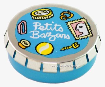 Bild av en livfull blå plåtburk med unika illustrationer