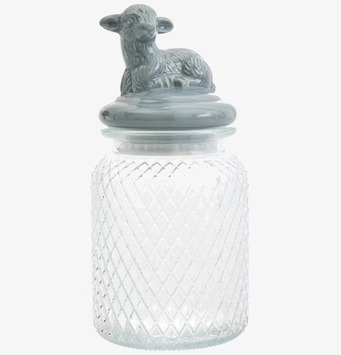 Bild av glasburk med lammfigur och diamantmönster