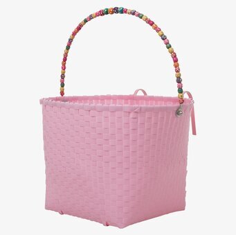 Bild av rosa cykelkorg med pärlhandtag och krok