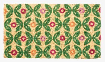 Bild av dörrmatta med livfullt lingonblommönster