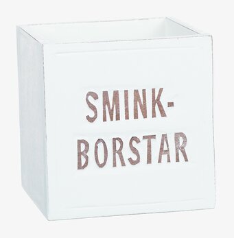 Bild av vit trälåda för sminkborstar med stilren text