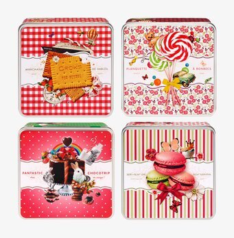 Bild av fyra eleganta plåtburkar med fransk design