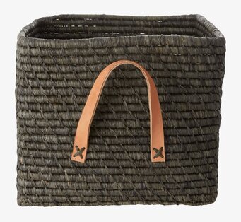 Foto av stilren mörkgrå förvaringskorg med läderhandtag