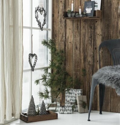 Bild av stilfull inredning med rustika och moderna inslag