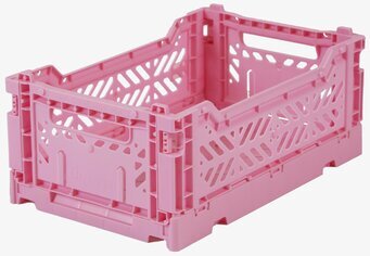 Bild av rosa förvaringsback med geometriska utskärningar