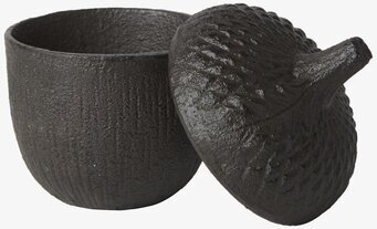 Foto av rustik skål med lock och naturinspirerad design