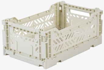 Bild av stilren och praktisk förvaringsback i krämfärg