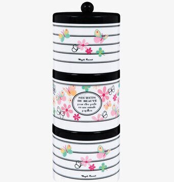 Foto av staplingsbara burkar med blommor och fjärilar