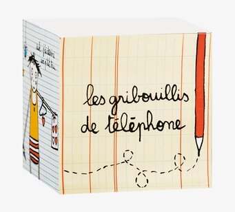 Bild av charmig kubformad plåtburk med lekfull design