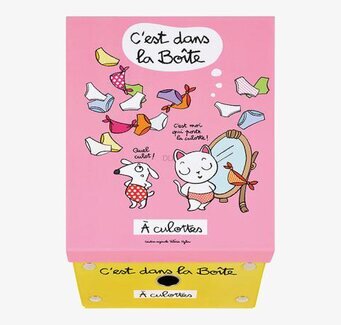 Foto av charmig och färgglad plåtburk med humoristisk design