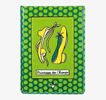 Bild av färgglad plåtburk med stilfull design och charm