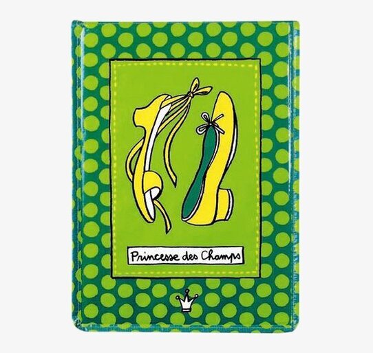 Bild av färgglad plåtburk med stilfull design och charm