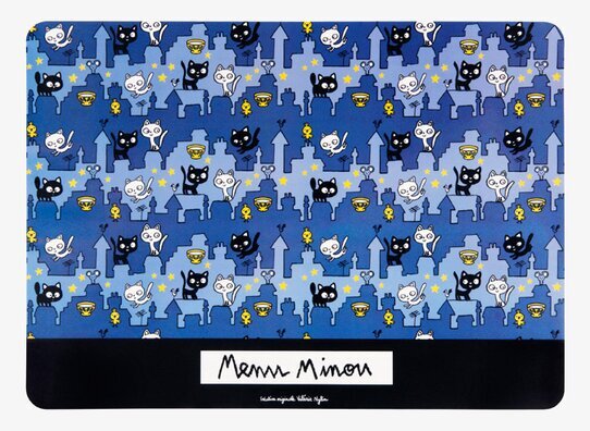 Bild av underlägg med kattmotiv och blå bakgrund