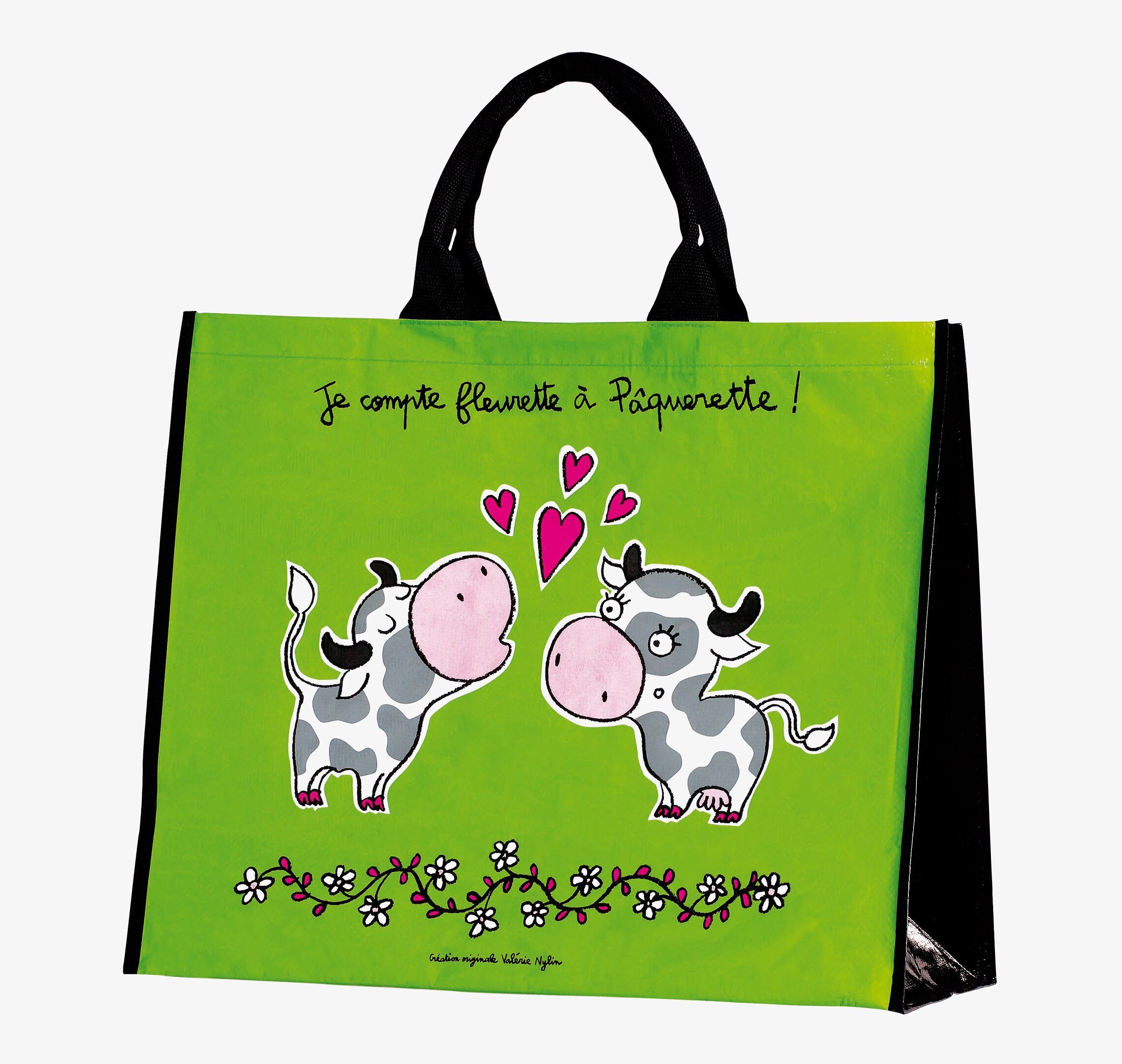 Bild av lekfull shoppingkasse med kor och fransk text