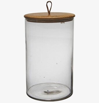 Bild av stilren glasburk med trälock och lädersnodd