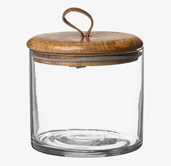 Bild av elegant glasburk med trälock och läderband