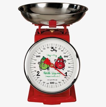 Bild av röd köksvåg med grönsaksillustrationer