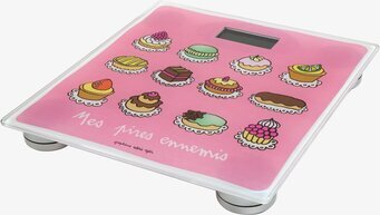 Bild av rosa badrumsvåg med bakverksillustrationer