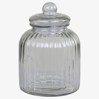 Foto av glasburk med lock och vertikala räfflor