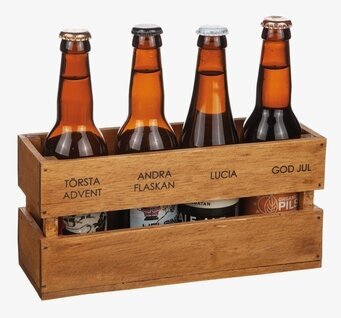 Foto av rustik trälåda för flaskor med julmotiv