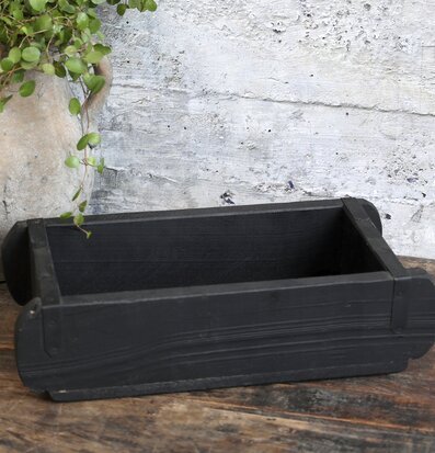 Foto av rustik murstensform med antiksvart finish