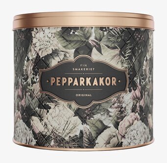 Bild av elegant plåtburk med blommigt vintermönster