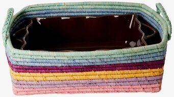Bild av elegant och färgglad korg för hemförvaring