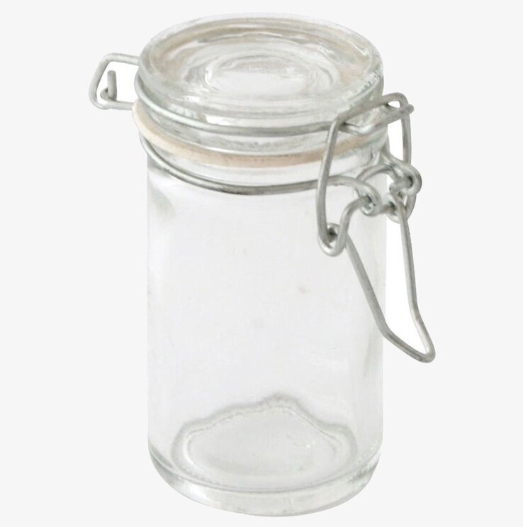 Foto av glasburk med patentlock och minimalistisk design