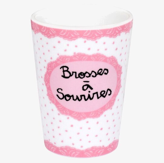 Bild av elegant rosa tandborstmugg med prickigt mönster