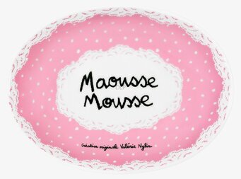 Bild av rosa tvålkopp med prickar och spetsdetaljer