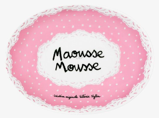 Bild av rosa tvålkopp med prickar och spetsdetaljer