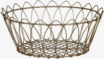 Foto av elegant trådkorg i antik mässingston