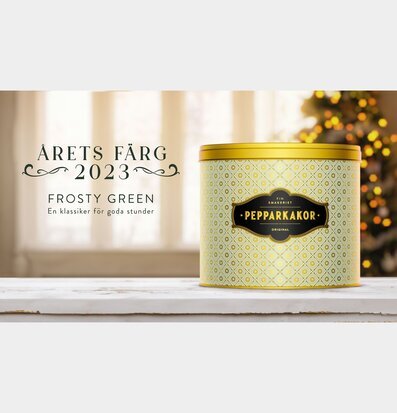 Bild av stilfull plåtburk med frostigt grön design