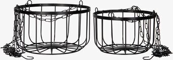 Bild av moderna svarta metallkorgar för inredning