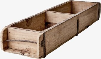 Foto av rustik trälåda med metallband och sektioner