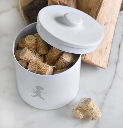 Bild av stilren vit förvaringsburk med braständare