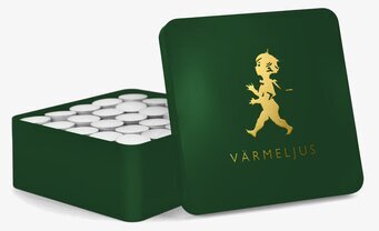 Bild av elegant plåtburk för värmeljus i grön/guld