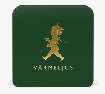 Bild av elegant grön och guld plåtburk för värmeljus