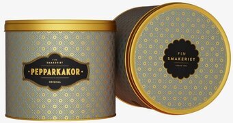 Bild av elegant blå plåtburk med geometriskt mönster