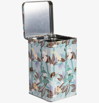 Bild av färgglad plåtburk med Muminmotiv och öppen insida