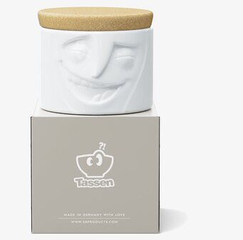 Bild av glad porslinsburk med korklock och ansikte