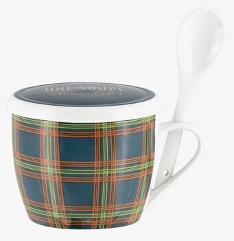 Bild av stilren kopp med sked i jordnära toner