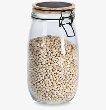 Bild av elegant glasburk med trälock och vita bönor