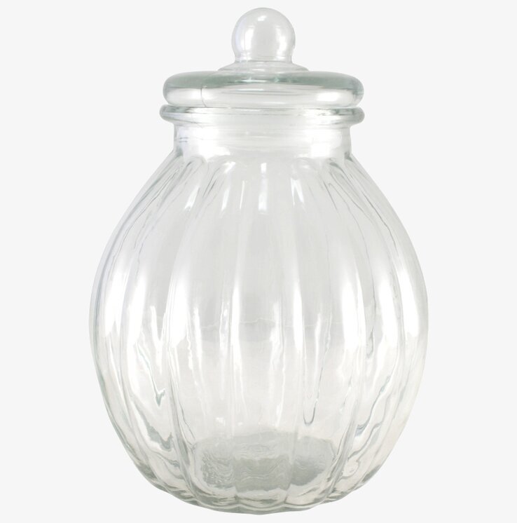 Foto av elegant glasburk med lock och strukturdetaljer